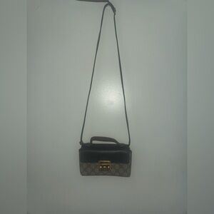 Gucci Monogrammed Mini top handle bag